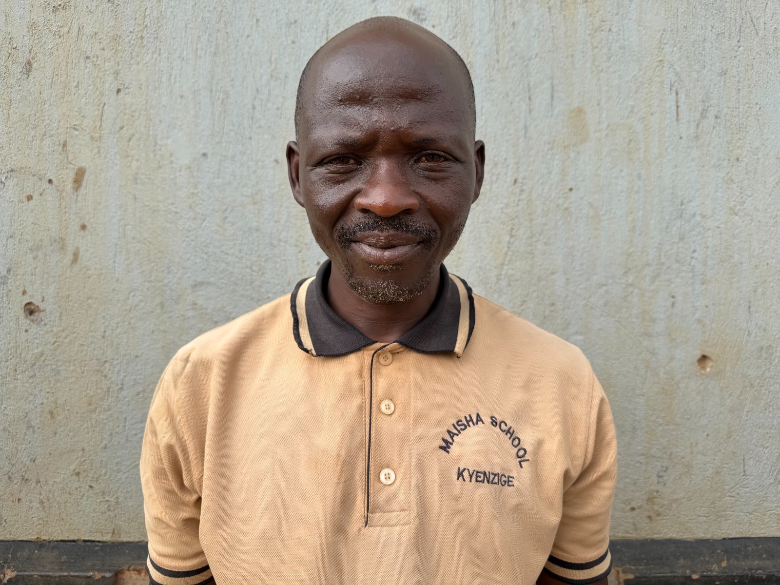 Mr. Kiiza Nelko, Cleaner at Maisha School