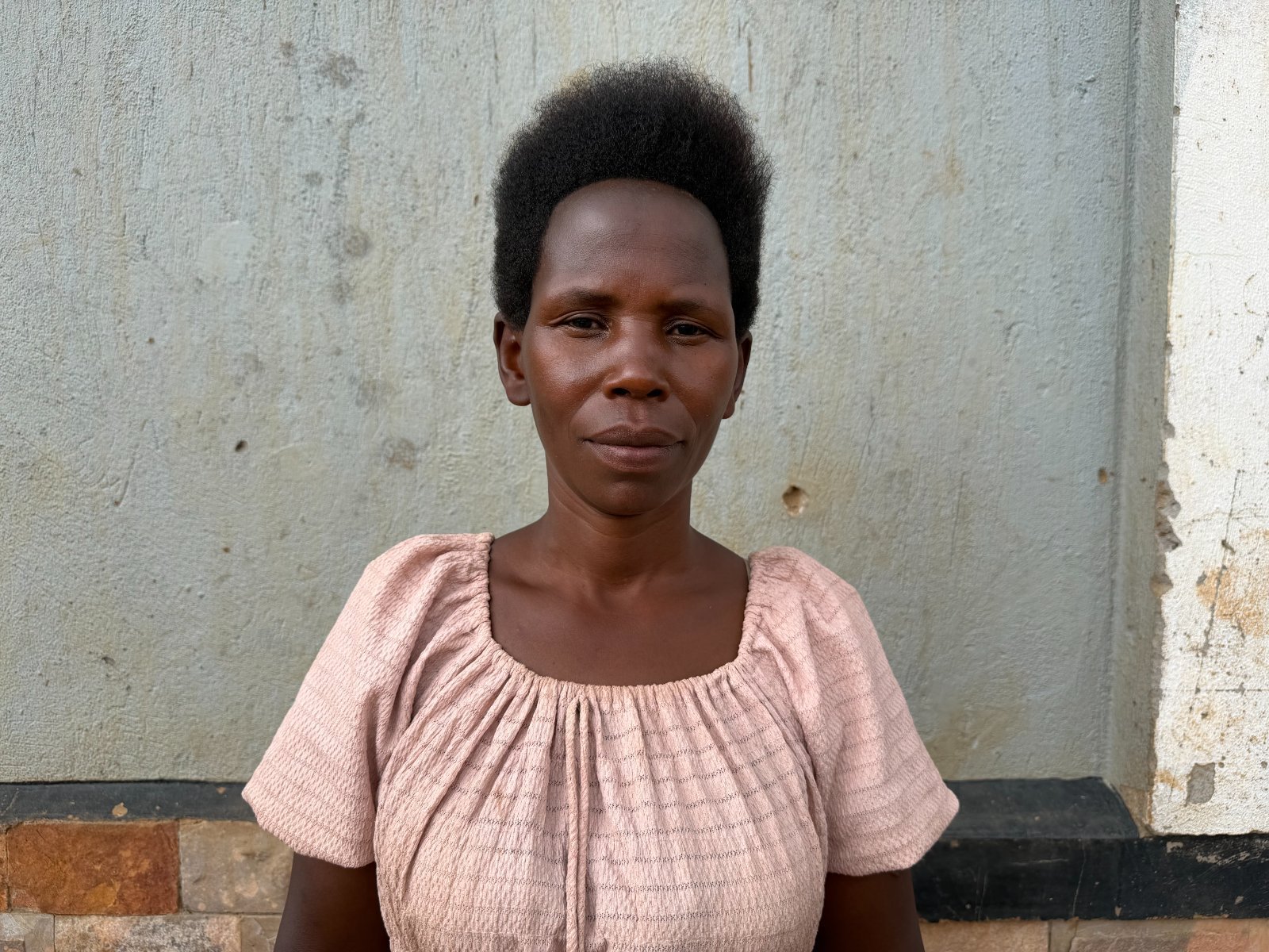Miss. Musiimenta Beatrace, Cleaner at Maisha School